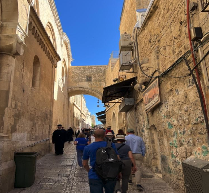 Root and Branch group walking through the historic alleyways of Jerusalem