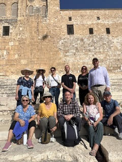 Root and Branch group at a historic site in Jerusalem
